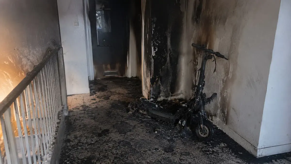 A burnt out hallway due to an ebike fire