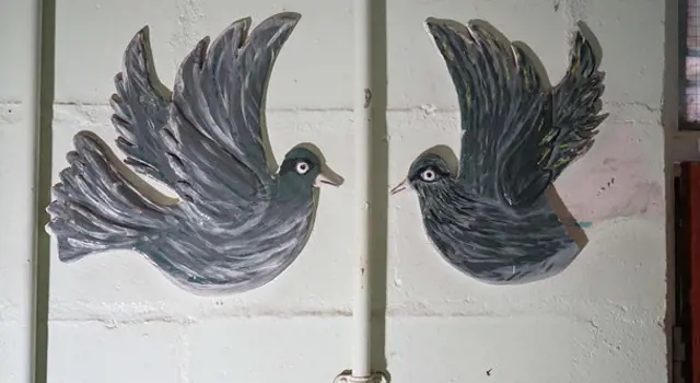 Painting of birds on tiles