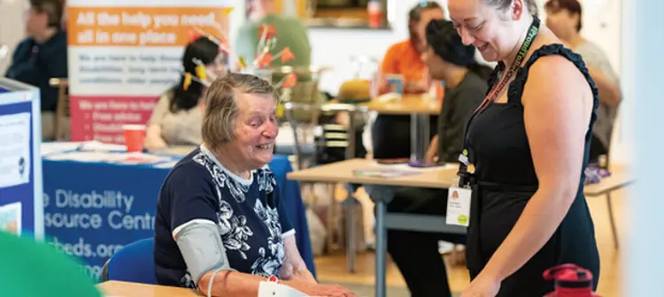 Person having blood pressure taken