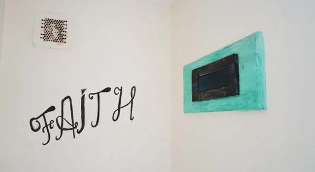 The Word Faith written on a wall